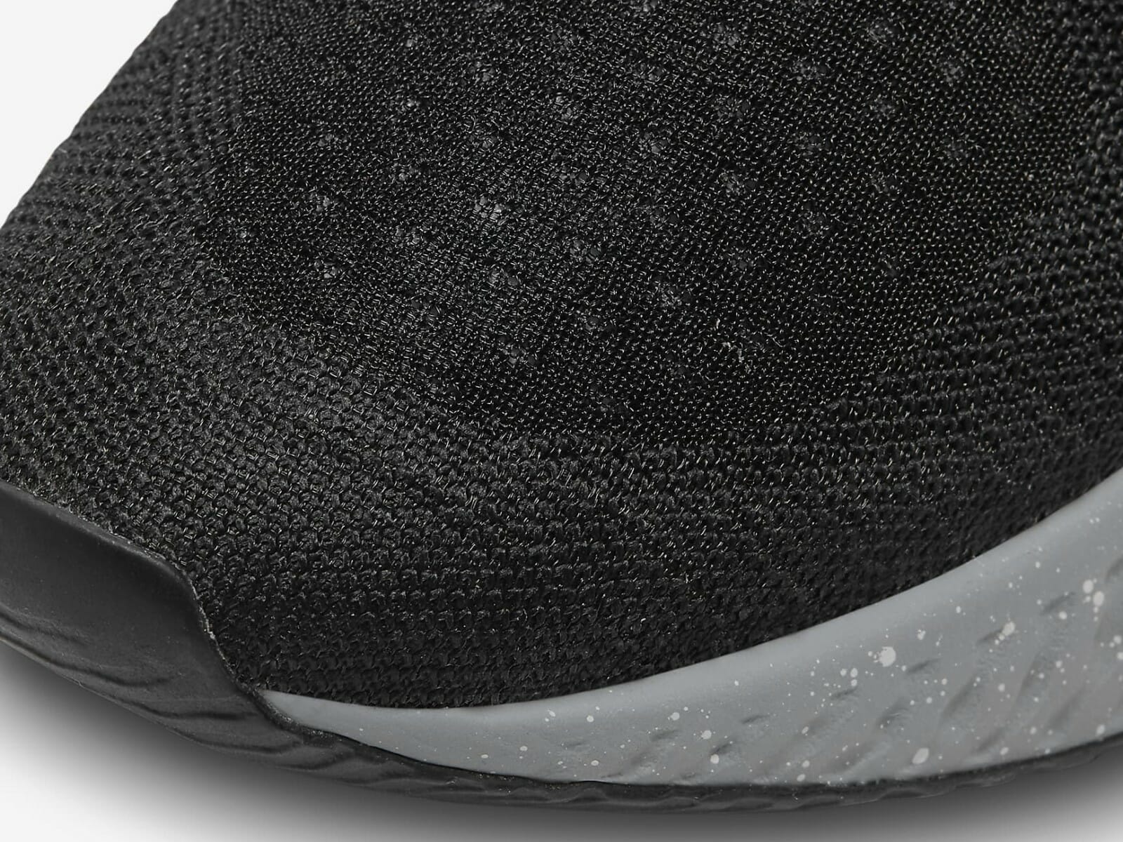 Detailed view of the flyknit mesh upper.