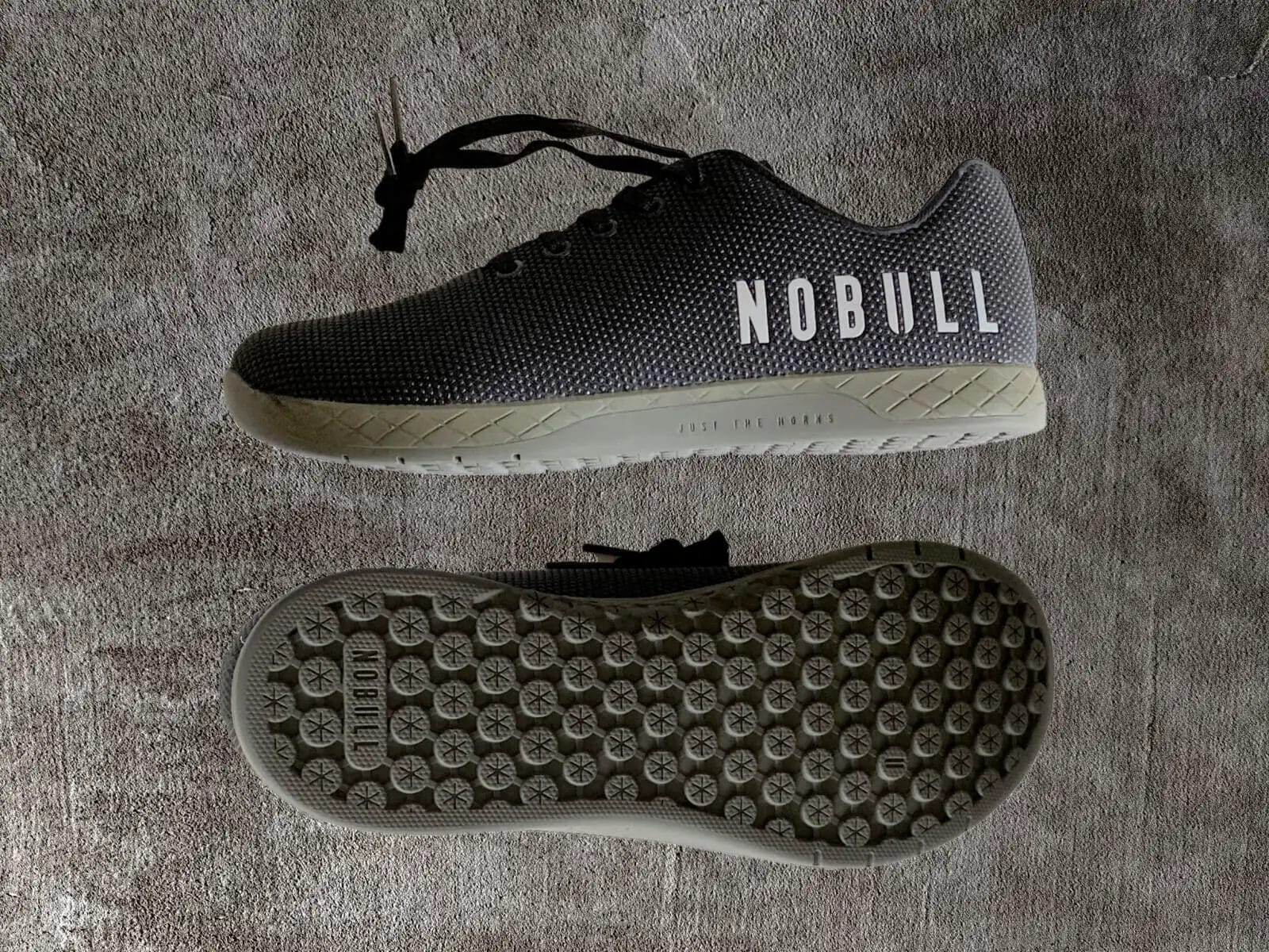 NoBull black trainers with details of profile and outsole.